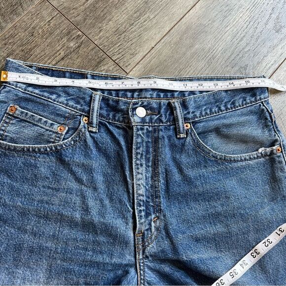 Levi's 550 Relaxed Fit Cutoff Denim Jean Shorts Classic Blue Distressed Frayed - Picture 8 of 10